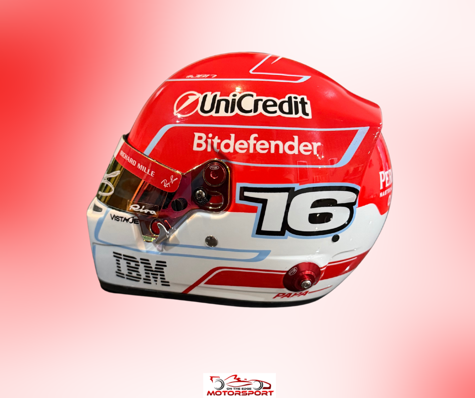 A red and white racing helmet with sponsor logos including UniCredit, Bitdefender, IBM, and VEX, featuring the number 16, shown against a red-to-white gradient background.